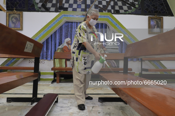 Volunteers from the Parish of St. Jude Thaddeus the Apostle located in Mexico City, Mexico, on April 28, 2021 sanitized facilities prior to...