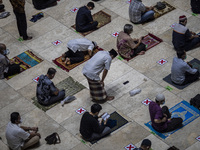 Muslim during Friday Pray at Istiqlal mosque in Jakarta, Indonesia, 30 April 2021. During ramadan in mid of covid19 pandemic mosque in Indon...