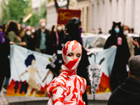 a mannequin with white and red tapes wrapped is seen during the Women Walpugis night protest in Bonn, Germany on April 30, 2021 (