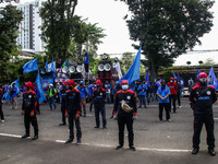 Indonesian workers maintaining social distance during May Day in Bandung, Indonesia on May, 01, 2021. Protesters across Indonesia have organ...