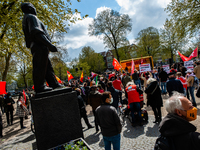 People is gathered around the Meijer square sculpture, during the International Worker's Day demonstration held in Amsterdam, on May 1st, 20...