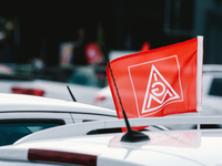 flag of IGM union is seen during the drive in labor day rally in Duesseldorf, Germany on May 1, 2021 (