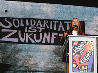 chairwoman DGB NRW Anja Weber speaks to the crowd during the drive in labor day rally in Duesseldorf, Germany on May 1, 2021 (