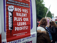The placard reads ''Patents on vaccines, Stop : Our lives are better worth than their profits'. Thousands of people took to the streets for...