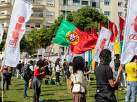 People holding placards and a Portuguese flags during the International Worker's Day, on May 1, in Lisbon, Portugal.
International Worker's...
