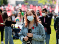 A women wearing mask with a red carnation during the International Worker's Day, on May 1, in Lisbon, Portugal.
International Worker's Day...