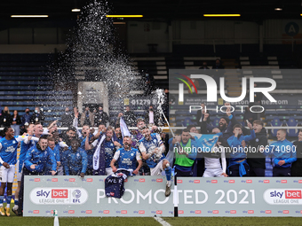  Peterborough United celebrate promotion to the Championship after the Sky Bet League 1 match between Peterborough and Lincoln City at Westo...
