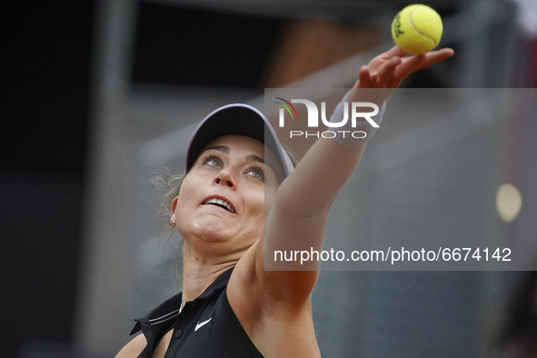 Paula Badosa of Spain in action during her round of 32 match against Jil Teichmann of Switzerland on day three of the Mutua Madrid Open tenn...
