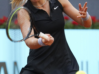 Paula Badosa of Spain in action during her round of 32 match against Jil Teichmann of Switzerland on day three of the Mutua Madrid Open tenn...