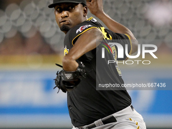 Pittsburgh Pirates relief pitcher Arquimedes Caminero pitches the ninth inning of a baseball game against the Detroit Tigers in Detroit, Mic...