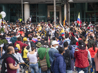 People protests in the streets of Bogota, Colombia, on May 1, 2021. In the celebration of Labor Day and the fourth day of the national strik...