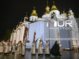 Priests of the Orthodox Church of Ukraine during the All-Night Easter Liturgy near the St Michael's Golden-Domed Cathedral in Kyiv, Ukraine,...