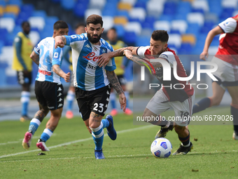 Nahitan Nandez of Cagliari Calcio competes for the ball with Elseid Hysaj of SSC Napoli during the Serie A match between SSC Napoli and Cagl...