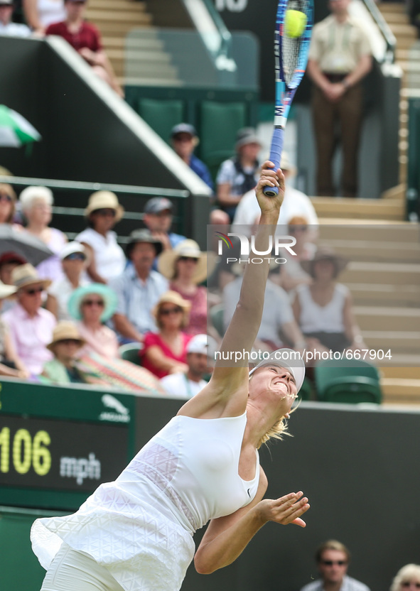 (150702) -- LONDON, July 2, 2015 () --  Maria Sharapova of Russia serves to Richel Hogenkamp of the Netherlands during the women's singles s...