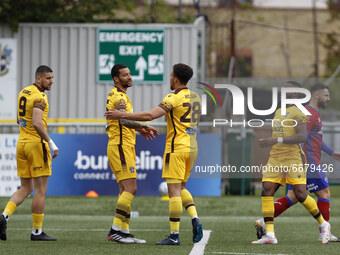  GOAL - Donovan Wilson of Sutton United acknowledges the assist from Craig Eastmond of Sutton United during National League between Sutton U...