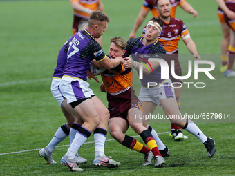 
 Elliott Hall of Batley Bulldogs is tackled during the BETFRED Championship match between Newcastle Thunder and Batley Bulldogs at Kingston...