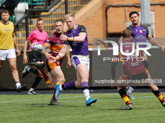 
 Kieran Gill of Thunder passes inside during the BETFRED Championship match between Newcastle Thunder and Batley Bulldogs at Kingston Park,...