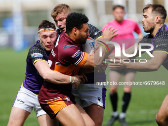 
 Jodie Broughton of Batley Bulldogs is tackled by Evan Simons during the BETFRED Championship match between Newcastle Thunder and Batley Bu...