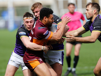 
 Jodie Broughton of Batley Bulldogs is tackled by Evan Simons during the BETFRED Championship match between Newcastle Thunder and Batley Bu...