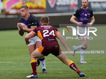 
 Nathan Wilde of Newcastle Thunder takes on the Bulldogs defence during the BETFRED Championship match between Newcastle Thunder and Batley...