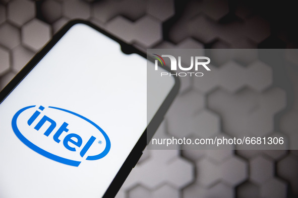 In this photo illustration an Intel logo seen displayed on a smartphone screen in Athens, Greece on May 3, 2021. (Photo illustration by Niko...