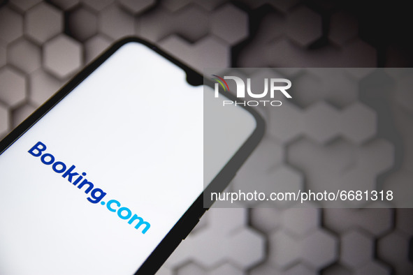 In this photo illustration a Booking.com logo seen displayed on a smartphone screen in Athens, Greece on May 3, 2021. (Photo illustration by...