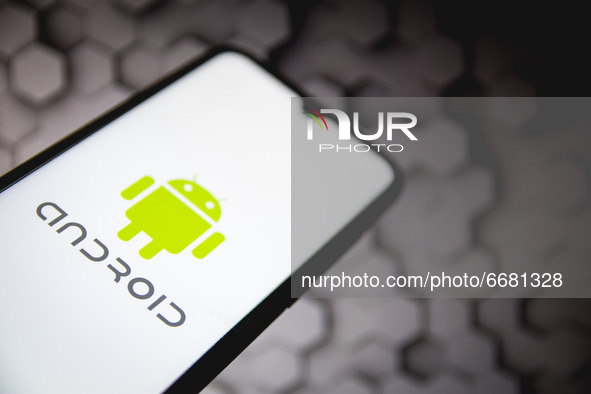 In this photo illustration an Android logo seen displayed on a smartphone screen in Athens, Greece on May 3, 2021. (Photo illustration by Ni...