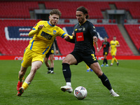 L-R Lewis Simper of Concord Rangers (on loan from Cambridge United) and Darren Lough of Hebburn Town  during  The 2019/2020 Buildbase FA Tro...