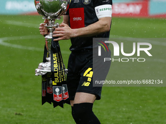 Josh Falkingham of Harrogate Town  holds The Buildbase FA Trophy during  The 2019/2020 Buildbase FA Trophy Final between Concord Rangers and...