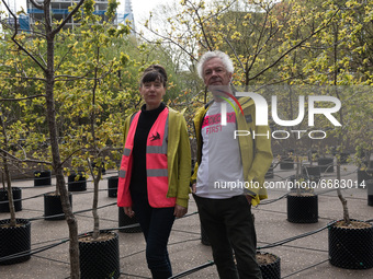 LONDON, UNITED KINGDOM - MAY 04, 2021: British artists (L-R) Heather Ackroyd and Dan Harvey pose with an installation of 100 oak saplings en...
