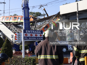  Firemen are  seen during the rescue the bodies of the victims where Mexico City subway olivos station overpass collapsed, killing 23 and in...