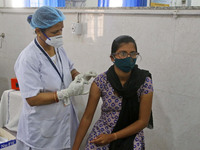 A young beneficiary receives the first dose of COVID-19 vaccine at Govt. Hospital Sethi Colony, in Jaipur, Rajasthan, India, on May 04, 2021...