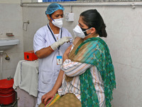 A young beneficiary receives the first dose of COVID-19 vaccine at Govt. Hospital Sethi Colony, in Jaipur, Rajasthan, India, on May 04, 2021...