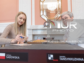 Natalia Sadowska and Tamara Tansykkuzhina (R) during Checker World Championship match in Warsaw, Poland, on May 1, 2021. (