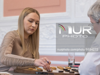 Tamara Tansykkuzhina (R) and Natalia Sadowska during Checker World Championship match in Warsaw, Poland, on May 1, 2021. (