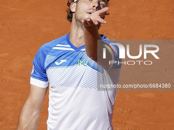 Marco Cecchinato in action during in his mens singles match against Roberto Bautista Agut of Spain during day six of the Mutua Madrid Open a...