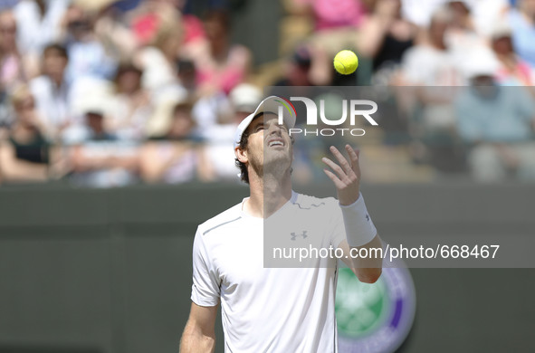 WIMBLEDON, July 2, 2015 () -- Andy Murray of Britain reacts during the men's singles second round against Robin Haase of the Netherlands at...