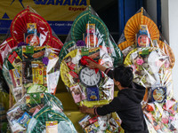 A man cleans gift baskets to sell ahead of the Eid al-Fitr holiday marking the end of the holy fasting month of Ramadan at Bandung, Indonesi...