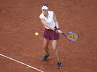 Belinda Bencic of Switzerland in action during her quarterfinal match against Paula Badosa of Spain during day seven of the Mutua Madrid Ope...