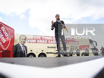 Scottish Labour Leader Anas Sarwar delivers a speech during a drive-in rally ahead of the Scottish elections at Caledonia House on May 5, 20...