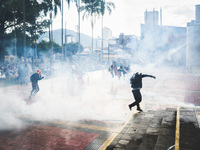 Demonstrators clash with riot police during a protest against President Ivan Duque's government in Pereira, Colombia on May 05, 2021. (