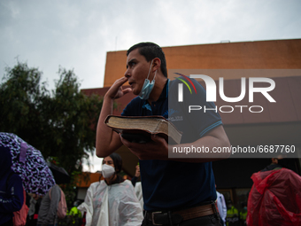 A priest is seen reading the bible during the demonstrations against police brutality that lead to international attention in Bogota, Colomb...
