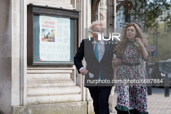 LONDON, UNITED KINGDOM - MAY 06, 2021: British Prime Minister Boris Johnson and his fiancee Carrie Symonds walk to a polling station at Meth...