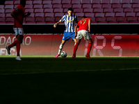 Luis Diaz of FC Porto (C ) vies with Diogo Goncalves of SL Benfica  during the Portuguese League football match between SL Benfica and FC Po...