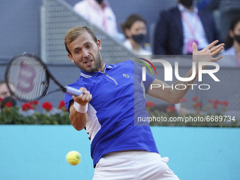 Daniel Evans of Great Britain in action during in his round of 16 match against Alexander Zverev of Germany on day eight of the Mutua Madrid...