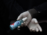 A man holds hand sanitizer at a hospital in Kathmandu, Nepal on Friday, May 7, 2021.  As the second wave of coronavirus disease surges acros...