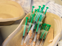 Ready syringe wait for first patients as they attend their Covid-19 vaccination appointments in the newly opened mass vaccination centre in...