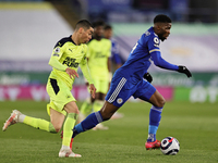 Kelechi Iheanacho of Leicester City runs with the ball followed by Miguel Almiron of Newcastle United during the Premier League match betwee...