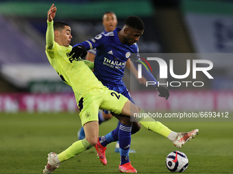 Kelechi Iheanacho of Leicester City is tackled by Miguel Almiron of Newcastle United during the Premier League match between Leicester City...