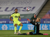 Callum Wilson of Newcastle United lobs Kasper Schmeichel of Leicester City during the Premier League match between Leicester City and Newcas...